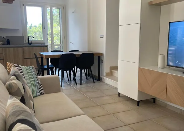 Daire Pinetamare Azur - Panoramic Rooftop Porto Selvaggio