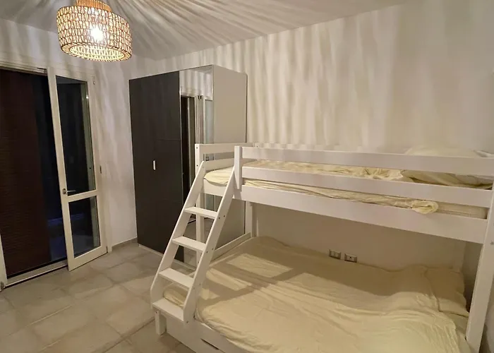 Pinetamare Azur - Panoramic Rooftop Porto Selvaggio Daire *